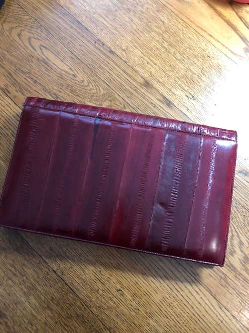 Genuine eelskin rusched clutch handbag